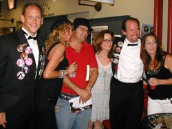 Ron, Jack (in tux/goatee) and members<br>of the Wild and Untamed Things<br>at the "Confessions" book party